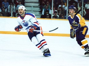 Edmonton Oilers winger Glenn Anderson, left, in action against the Los Angeles Kings at Northlands Coliseum in Edmonton, date unknown.