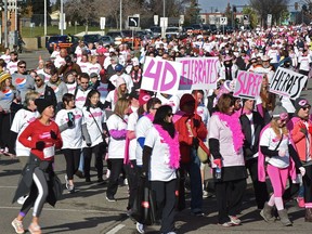Participants run and walk in the Canadian Breast Cancer Foundation CIBC Run for the Cure along Kingway Ave. near 109 St. in Edmonton Oct.  2, 2016. It is one of many activities that take place in October to bring attention to the fight against breast cancer.