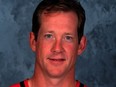 Phil Housley's mug shot with the Calgary Flames in 1999.