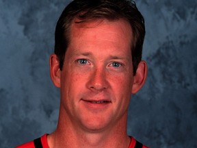 Phil Housley's mug shot with the Calgary Flames in 1999.