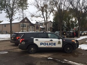 Police investigate a shooting at 120 Avenue and 125 Street in Edmonton on Oct. 18, 2016.