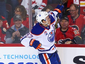 Edmonton Oilers Connor McDavid celebrates after scoring against the Calgary Flames in the first period during in Calgary on Friday, October 14, 2016.