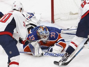 Edmonton's goaltender Cam Talbot (33) makes a save during the second period of a NHL game between the Edmonton Oilers and the Washington Capitals at Rogers Place in Edmonton, Alberta on Wednesday, October 26, 2016. Ian Kucerak / Postmedia