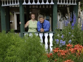 Jack Oosterveld, with his wife Bev in the garden of their Sherwood Park home in 2007, has been banned for life from the mutual fund industry following a decision by  the Mutual Fund Dealers Association of Canada hearing panel this week.