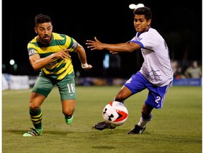 Tampa Bay Rowdies midfielder Juan Guerra, left, is able to get by FC Edmonton midfielder Shamit Shome in a North American Soccer League match in Tampa, Florida earlier this year. The teams meet again Sunday at Clarke Stadium.