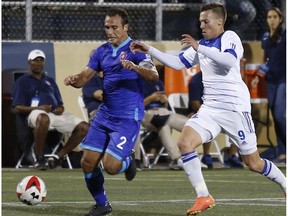 FC Edmonton midfielder Ben Fisk, right, chases down Miami FC defender Jonathan Borrajo in a North American Soccer League game at Florida International University Stadium in Miami, Florida, on Friday, Oct. 28, 2016. Miami won the game 1-0.