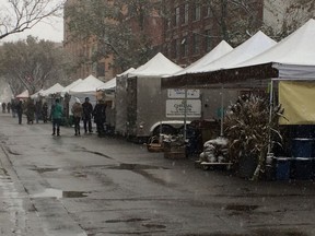 The first snowy day of fall hit on this year's final outdoor Edmonton downtown farmers' market. Saturday, Oct. 8, 2016.