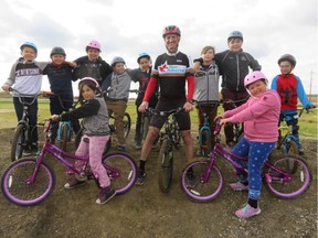 Don Patterson (centre), a keen touring cyclist, brought sections of the community together with Enoch Cree Nation leaders to create a BMX-style pump track on Enoch Cree Nation land.