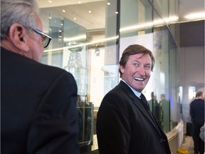 Wayne Gretzky laughs at the unveiling of the Wayne Gretzky statue and Hall of Fame room in Edmonton on Wednesday October 12, 2016.