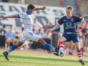 FC Edmonton midfielder Shamit Shome, right, challenges Indy Eleven midfielder Brad Ring for the ball in NASL play on Sunday, July 23, 2016 in Indianapolis, Indiana. The Indy Eleven won 1-0. The two teams play each other in the NASL semifinal on Saturday.