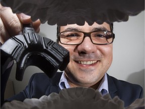 SmileSonica Inc. founder Cristian Scurtescu holds the mouthpiece to the company's Aevo System
