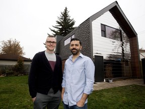 Jesse Watson and German Antonio Gomez-Decuir in front of their 680-square-foot laneway house in the Calder neighbourhood.