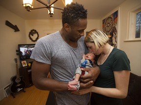 Jesse and Julia Lipscombe with their newborn son Indiana.