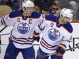 Edmonton Oilers' Jordan Eberle, right, celebrates his goal with teammate Connor McDavid during the first period of an NHL hockey game against the Pittsburgh Penguins in Pittsburgh, Tuesday, Nov. 8, 2016.