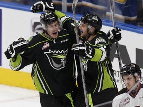 Edmonton's Tyler Robertson, centre, celebrates a goal with Jesse Roach during the first period of a WHL game between the Edmonton Oil Kings and the Medicine Hat Tigers at Rogers Place  in Edmonton, Alberta on Saturday, October 29, 2016. Robertson had nine points on a recent seven-game road trip for the Oil Kings.