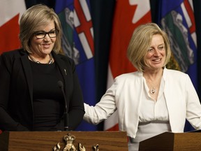 Progressive Conservative MLA Sandra Jansen (left) announced alongside Premier Rachel Notley that she left the PC party and joined the Alberta New Democratic Party during a news conference at the Alberta Legislature in Edmonton, Alberta on Thursday, Nov.17, 2016.