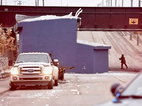 A truck carrying a shed hit an overpass at 66 Street and Fort Road Wednesday morning