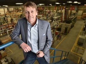 Richard Scott, CEO of All Weather Windows overlooks the ground floor assembly operations in Edmonton.