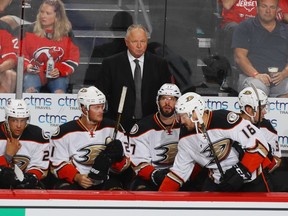 Head coach Randy Carlyle of the Anaheim Ducks handles bench duties against the New Jersey Devils at the Prudential Center on October 18, 2016, in Newark, New Jersey.