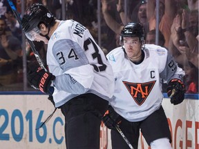 Team North America's Auston Matthews celebrates his goal with teammate Connor McDavid, right, against Sweden during first period World Cup of Hockey action in Toronto, Wednesday September 21, 2016. The NHL's last two No. 1 overall picks will meet for the first time tonight as Matthews' Toronto Maple Leafs host McDavid's Edmonton Oilers.