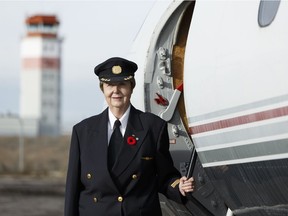 Canadian aviation trailblazer Capt. Rosella Bjornson poses for a photo after a ceremony at the Alberta Aviation Museum in her honour in Edmonton, Alberta on Saturday, November 5, 2016. Bjornson was Canada's first female airline captain.