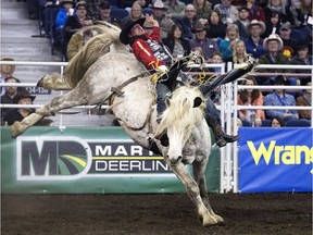 Bareback rider Jake Vold takes part in the second go-round of the Canadian Finals Rodeo at Northlands Coliseum, in Edmonton on Thursday Nov. 9, 2016.