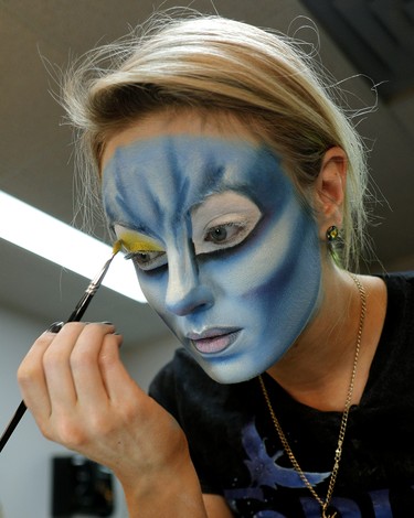 Cirque du Soleil performer Jessica Ward puts on her makeup in Edmonton on Tuesday November 29, 2016, where she was on a media tour for the upcoming production of Toruk-The First Flight, a new show by Cirque du Soleil inspired by James Cameron's movie Avatar. Cirque du Soleil is a Canadian entertainment company and largest theatrical producer in the world. (Photo by Larry Wong/Postmedia)