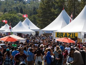 Crowds make their way through the festival grounds during the 2016 Heritage Festival at Hawrelak Park in Edmonton on Aug. 1, 2016.