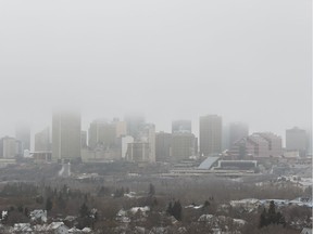 Downtown Edmonton is seen covered in fog from the southside at Strathearn Drive and 92 Street in Edmonton, Alberta on Monday, November 21, 2016.