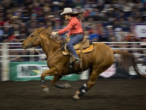 Kirsty White competes in the ladies barrel race at the Canadian Finals Rodeo at Rexall Place in Edmonton on November 11, 2015.