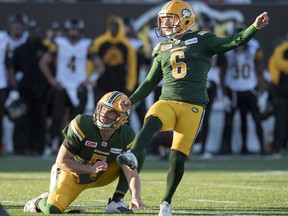 Edmonton Eskimos' kicker Sean Whyte (6) and quarterback Jordan Lynch watch the game winning field goal against the Hamilton Tiger-Cats in CFL playoff action, in Hamilton, Ont., on Sunday, November 13, 2016.