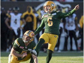 Edmonton Eskimos' kicker Sean Whyte (6) and quarterback Jordan Lynch watch the game winning field goal against the Hamilton Tiger-Cats in CFL playoff action, in Hamilton, Ont., on Sunday, November 13, 2016.