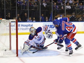 Michael Grabner #40 of the New York Rangers scores at 15:46 of the second period against Cam Talbot #33 of the Edmonton Oilers at Madison Square Garden on November 3, 2016 in New York City.