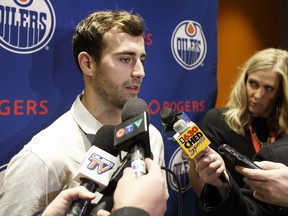 Edmonton's Jordan Eberle (left) speaks to the media after an Edmonton Oilers practice at Rogers Place in Edmonton, Alberta on Monday, November 14, 2016.