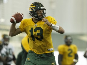 Edmonton's quarterback Mike Reilly throws the ball at practice in the Field House at Commonwealth Community Recreation Centre in Edmonton, Alberta on Wednesday, November 2, 2016.