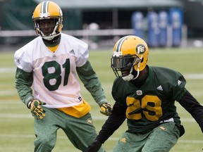 Devon Bailey (81)and Cord Parks (29) take part in an Edmonton Eskimos' team practice at Commonwealth Stadium, in Edmonton on Tuesday Oct. 18, 2016. Photo by David Bloom