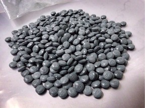 Fentanyl pills are shown in an undated police handout photo. Police and Alberta health officials have raised the alarm about a dangerous drug called W-18 that is much more toxic than fentanyl, another opioid that has been linked to hundreds of deaths in Canada.