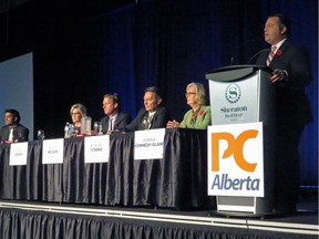 Former Conservative MP Jason Kenney speaks to 1,100 members in the first Alberta Progressive Conservative party leadership forum while the other five leadership candidates — from left, Stephen Khan, Sandra Jansen, Byron Nelson, Richard Starke and Donna Kennedy Glans — listen in Red Deer on Saturday, November 5, 2016.