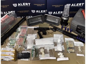 Four homes in Grande Prairie were searched as part of a drug trafficking investigation conducted by ALERT on Nov. 16, 2016. Three firearms and more than $40,000 in drugs and cash were seized.