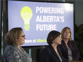 Alberta's Deputy Premier Sarah Hoffman (left) Environment Minister Shannon Phillips (centre) and Energy Minister Marg McCuaig-Boyd (right) outlined the provincial government's plan to move away from coal-fired electricity at an event at the Federal Building in Edmonton on Nov. 24, 2016.
