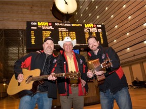 Glen Baker, left, Dave Miller, centre, and Matt Beatty took the train from Calgary to Toronto for the Grey Cup, arriving Tuesday morning. Actually, they had to catch the train from Edmonton. For features by Edmonton columnist Terry Jones.