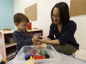 Aidan Brown, 2, plays with his mother Lily Ma during an open house held at Kids & Company in the Edmonton Tower in downtown Edmonton, Alberta on Tuesday, November 15, 2016. The daycare will open in a few weeks.