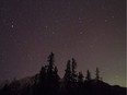 The stars are seen over an island in Pyramid Lake in the Dark Skies Preserve at Jasper, on Nov. 15, 2014.