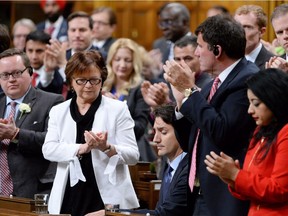 Prime Minister Justin Trudeau, centre, is applauded by members of the Liberal party after addressing the House of Commons on Parliament Hill in Ottawa on May 19, 2016. Trudeau apologized for his conduct following an incident in the House when he pulled Conservative whip Gord Brown through a clutch of New Democrat MPs to hurry up a vote related to doctor-assisted dying. A letter writer says Canadians should not feel too smug about our political system.