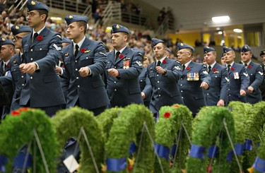 Members of the Canadian Air Force march past wreaths played in temperance of fallen soldier during a Remembrance Day ceremony in Edmonton on Friday November 11, 2016.
