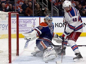 The New York Rangers' Michael Grabner (40) scores on the Edmonton Oilers' goalie Cam Talbot (33) during second period NHL action at Rogers Place, in Edmonton on Sunday Nov. 13, 2016.  Photo by David Bloom Photos off Oilers game for multiple writers copy in Nov. 14 editions.