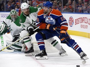The Edmonton Oilers' Patrick Maroon (19) battles the Dallas Stars' Stephen Johns (28) during second period NHL action at Rogers Place, in Edmonton on Friday Nov. 10, 2016.  Photo by David Bloom Photos off Oilers game for multiple writers copy in Nov. 12 editions.