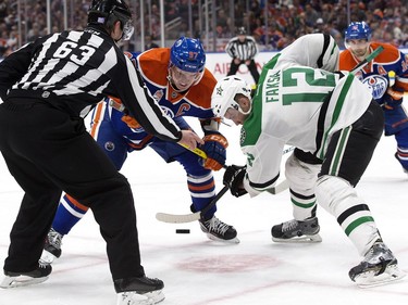 The Edmonton Oilers' Connor McDavid (97) takes a face-off against the Dallas Stars' Radek Faksa (12) during second period NHL action at Rogers Place, in Edmonton on Friday Nov. 10, 2016.