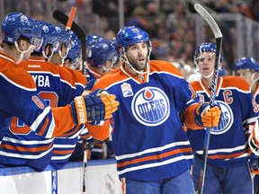 Edmonton Oilers' Patrick Maroon (19) celebrates a goal against the Dallas Stars during first period NHL action in Edmonton, Alta., on Friday November 11, 2016.