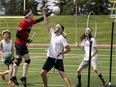 Player take part in a quidditch tournament at Johnny Bright Sports Park in West Jasper Place.